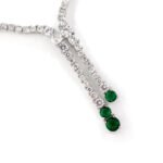 Niche lariat tennis necklace jewelry set wholesale featuring a Y-shaped drop tennis necklace and linear dangle drop earrings with sparkling cubic zirconia accents from junejewelry.com