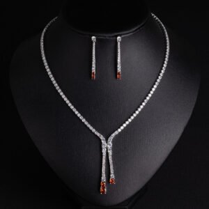 Niche lariat tennis necklace jewelry set wholesale featuring a Y-shaped drop tennis necklace and linear dangle drop earrings with sparkling cubic zirconia accents from junejewelry.com