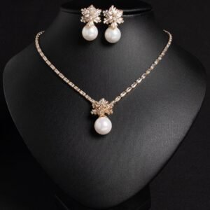Niche snowflake pearl pendant jewelry set wholesale featuring a cubic zirconia tennis necklace with a snowflake crystal star burst and smooth pearl pendant, paired with matching pearl drop earrings from junejewelry.com