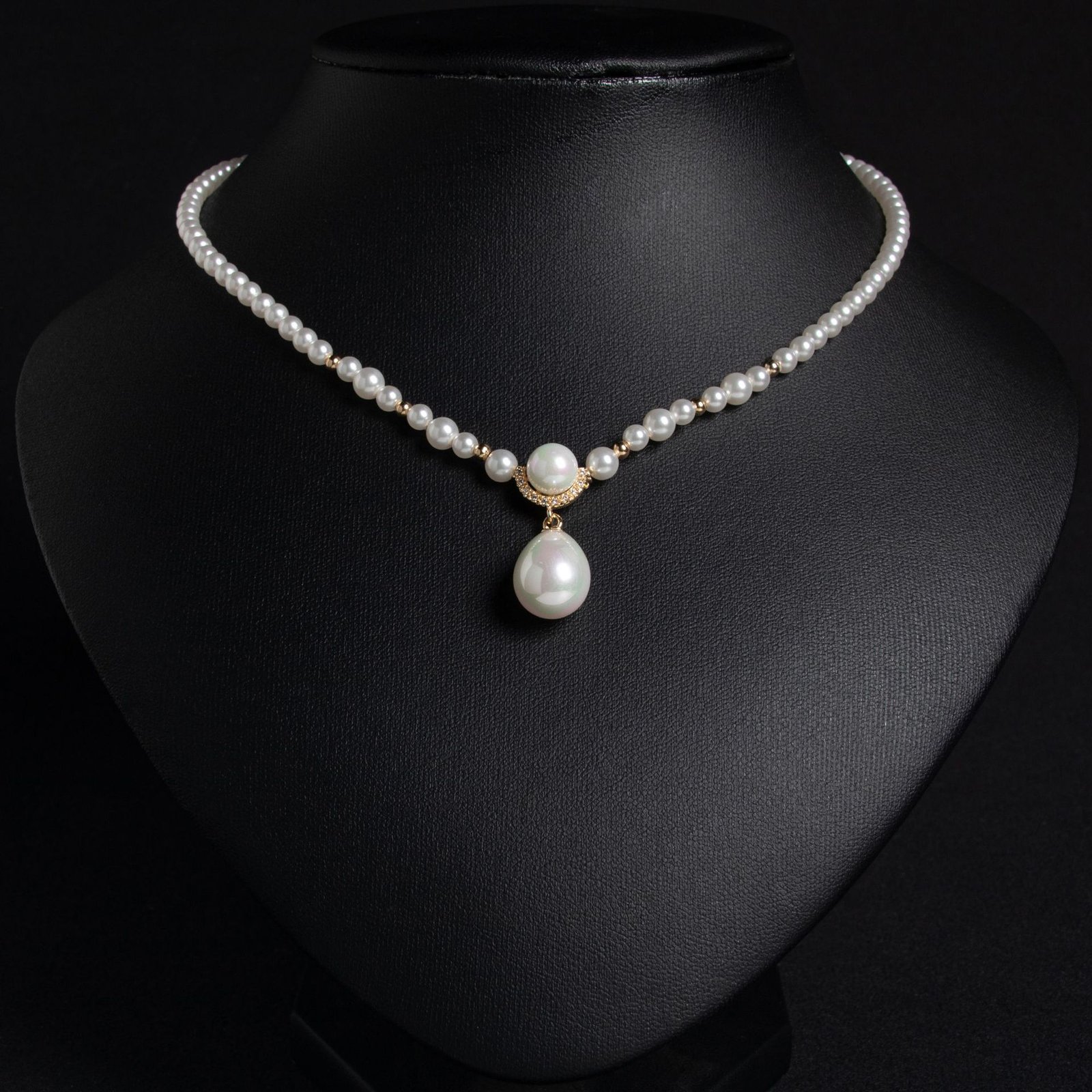 LYXL30626 (2) Light luxury tear drop pearl strand necklace wholesale featuring a delicate white pearl bead chain with a pave CZ arched crown connector and large teardrop pearl pendant from junejewelry.com