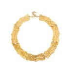 Model wearing 18K gold plated textured curved plate statement collar choker necklace