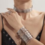 Gold and silver multi strand wire choker necklace, cuff bangle, and statement ring set model preview