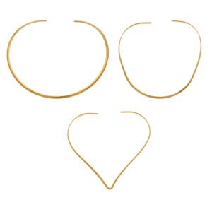 Model wearing gold plated minimalist rigid wire torque collar choker necklace in stainless steel