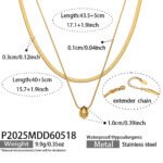 Model wearing double layer gold teardrop pendant necklace with flat snake chain