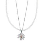 Niche layered daisy pearl necklace wholesale featuring a dual-strand design with a full pearl choker strand and a fine silver chain suspending a micro-pave cubic zirconia daisy pendant from junejewelry.com