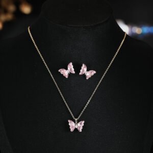 Niche ice translucent butterfly zircon jewelry set wholesale featuring carved crystal butterfly wings with marquise zircon bodies on a fine chain pendant necklace and matching stud earrings from junejewelry.com