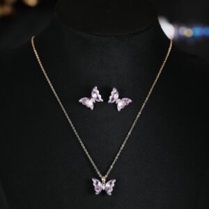 Niche ice translucent butterfly zircon jewelry set wholesale featuring carved crystal butterfly wings with marquise zircon bodies on a fine chain pendant necklace and matching stud earrings from junejewelry.com