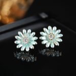 Niche daisy flower enamel necklace earring set wholesale featuring a crescent arrangement of multi-colored enamel daisy blossoms with pave zircon centers and matching daisy stud earrings from junejewelry.com
