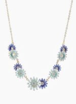 Niche daisy flower enamel necklace earring set wholesale featuring a crescent arrangement of multi-colored enamel daisy blossoms with pave zircon centers and matching daisy stud earrings from junejewelry.com