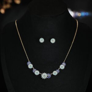 Niche daisy flower enamel necklace earring set wholesale featuring a crescent arrangement of multi-colored enamel daisy blossoms with pave zircon centers and matching daisy stud earrings from junejewelry.com