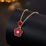 Niche multicolor flower enamel jewelry set wholesale featuring a double-tiered five-petal flower pendant with micro-beaded edges and brilliant round cubic zirconia centers, with matching drop stud earrings from junejewelry.com