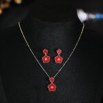 Niche multicolor flower enamel jewelry set wholesale featuring a double-tiered five-petal flower pendant with micro-beaded edges and brilliant round cubic zirconia centers, with matching drop stud earrings from junejewelry.com