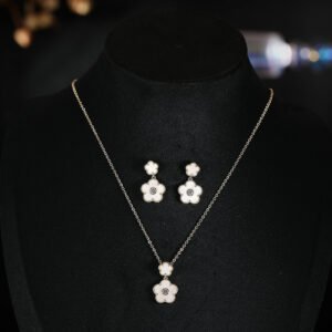 Niche multicolor flower enamel jewelry set wholesale featuring a double-tiered five-petal flower pendant with micro-beaded edges and brilliant round cubic zirconia centers, with matching drop stud earrings from junejewelry.com
