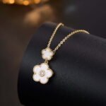 Niche multicolor flower enamel jewelry set wholesale featuring a double-tiered five-petal flower pendant with micro-beaded edges and brilliant round cubic zirconia centers, with matching drop stud earrings from junejewelry.com