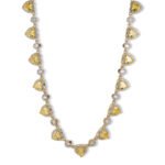 Heart zircon jewelry set wholesale 4-piece featuring heart-cut gemstone halo links on a necklace, matching tennis bracelet, solitaire halo ring, and stud earrings from junejewelry.com
