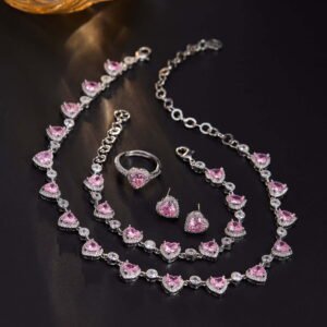 Heart zircon jewelry set wholesale 4-piece featuring heart-cut gemstone halo links on a necklace, matching tennis bracelet, solitaire halo ring, and stud earrings from junejewelry.com