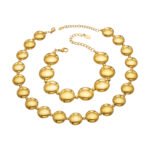 Chunky stainless steel necklace and bracelet jewelry set featuring smooth high-polish round flat disc beads in gold and silver finishes.