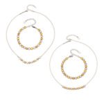 Two-tone gold and silver stainless steel jewelry set featuring alternating smooth silver beads, gold star motifs, textured gold station beads, and a sleek snake chain.