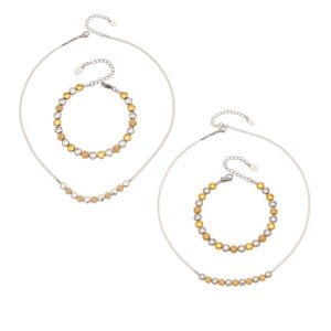 Two-tone gold and silver stainless steel jewelry set featuring alternating smooth silver beads, gold star motifs, textured gold station beads, and a sleek snake chain.
