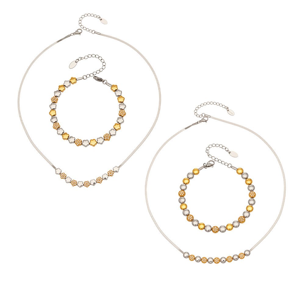 TXP102-TXE102 (1) Two-tone gold and silver stainless steel jewelry set featuring alternating smooth silver beads, gold star motifs, textured gold station beads, and a sleek snake chain.