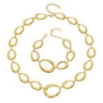 Gold, silver, and two-tone irregular oval link chain necklace and bracelet jewelry set model wear