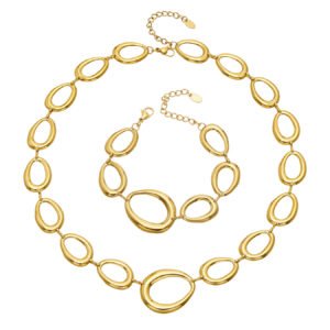 Gold, silver, and two-tone irregular oval link chain necklace and bracelet jewelry set model wear