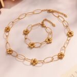 Stainless steel modern flower oval paperclip chain necklace and bracelet set image