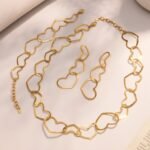 18K gold plated hollow openwork heart link chain necklace bracelet and drop earrings set model preview