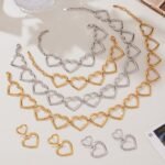 Gold and silver geometric hollow heart chain necklace bracelet and drop earrings set model preview