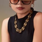 Stainless steel chunky coffee bean link chain necklace and matching bracelet set in gold, silver, and two-tone finishes.