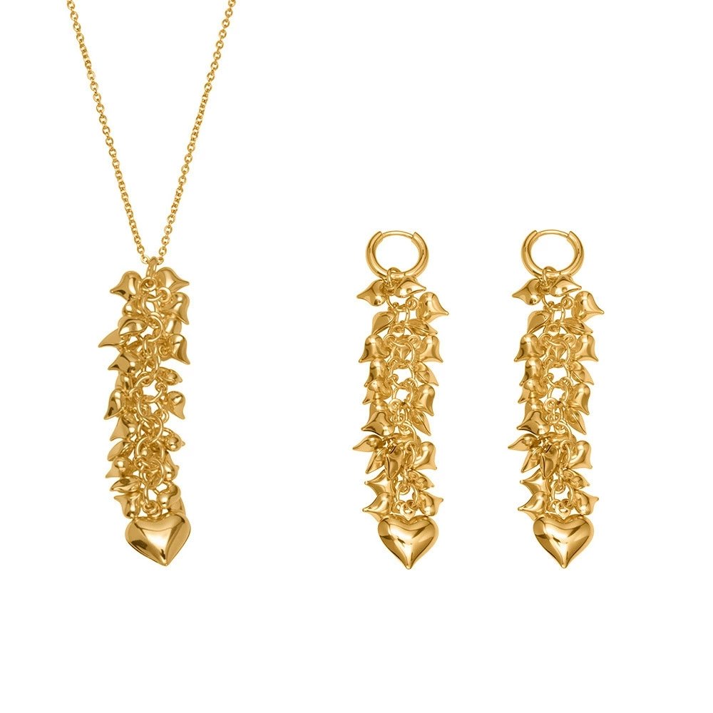 Gold and silver cascading heart tassel pendant necklace and drop earrings set model preview