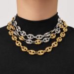 Stainless steel mariner link chain necklace and bracelet jewelry set in 18K gold, silver, and two-tone finishes.