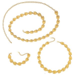 Textured ribbed seashell motif link necklace and bracelet set in two-tone gold and silver stainless steel finishes.