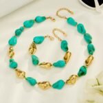Chunky irregular resin nugget and gold plated molten metallic beaded necklace and bracelet set