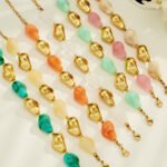 Chunky irregular resin nugget and gold plated molten metallic beaded necklace and bracelet set