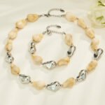 Chunky irregular resin nugget and gold plated molten metallic beaded necklace and bracelet set