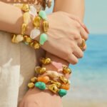Chunky irregular resin nugget and gold plated molten metallic beaded necklace and bracelet set