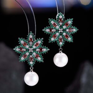 Snowflake CZ freshwater pearl drop earrings featuring an intricate starburst starburst pattern, princess-cut gems, micro-paved borders, and a round freshwater pearl dangle