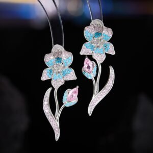 Elegant Iris flower CZ drop earrings featuring micro-pave cubic zirconia petals, a gem-set bud stem, and 925 sterling silver posts available on junejewelry.com
