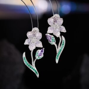 Elegant Iris flower CZ drop earrings featuring micro-pave cubic zirconia petals, a gem-set bud stem, and 925 sterling silver posts available on junejewelry.com
