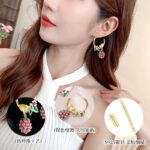 Hand-painted enamel squirrel and pearl blackberry cluster hoop earrings featuring white floral blossoms, a swinging pearl berry cluster, and 925 sterling silver ear posts