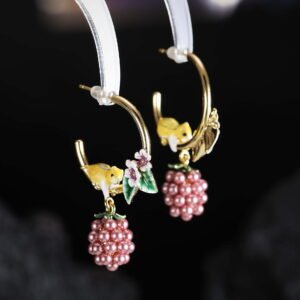 Hand-painted enamel squirrel and pearl blackberry cluster hoop earrings featuring white floral blossoms, a swinging pearl berry cluster, and 925 sterling silver ear posts
