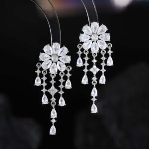 Floral CZ chandelier tassel earrings featuring a flower cluster stud, cascading teardrop gemstone fringes, and 925 sterling silver ear posts.