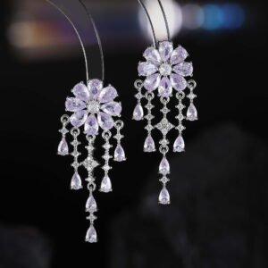 Floral CZ chandelier tassel earrings featuring a flower cluster stud, cascading teardrop gemstone fringes, and 925 sterling silver ear posts.