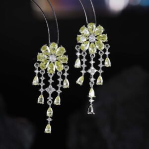 Floral CZ chandelier tassel earrings featuring a flower cluster stud, cascading teardrop gemstone fringes, and 925 sterling silver ear posts.