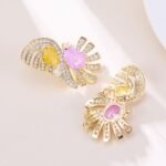 Vintage Art Deco CZ statement earrings wholesale featuring dual oval crackle gemstones surrounded by pavé cubic zirconia fan ribbons and S925 sterling silver posts from junejewelry.com