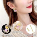 Vintage Art Deco CZ statement earrings wholesale featuring dual oval crackle gemstones surrounded by pavé cubic zirconia fan ribbons and S925 sterling silver posts from junejewelry.com