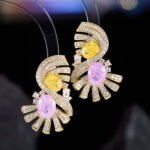 Vintage Art Deco CZ statement earrings wholesale featuring dual oval crackle gemstones surrounded by pavé cubic zirconia fan ribbons and S925 sterling silver posts from junejewelry.com