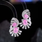 Vintage Art Deco CZ statement earrings wholesale featuring dual oval crackle gemstones surrounded by pavé cubic zirconia fan ribbons and S925 sterling silver posts from junejewelry.com
