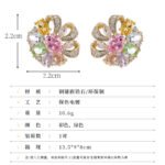 Floral pinwheel CZ cluster stud earrings featuring a swirling halo of multi-cut gemstones, micro-paved ribbon swirls, and 925 sterling silver ear posts